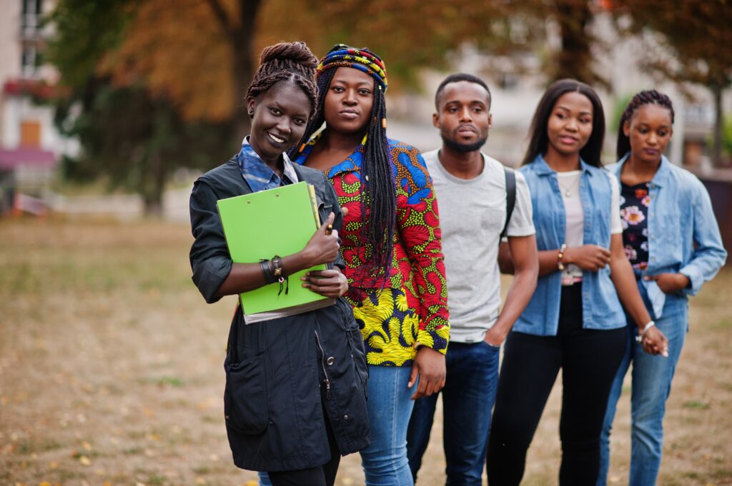 A group of young African students standing together outdoors